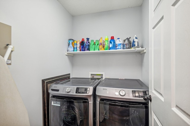 laundry room with independent washer and dryer