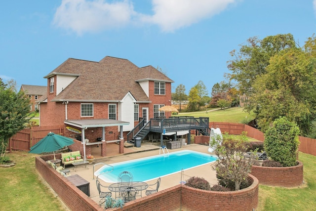 view of pool with area for grilling, a patio, an outdoor living space, and a wooden deck