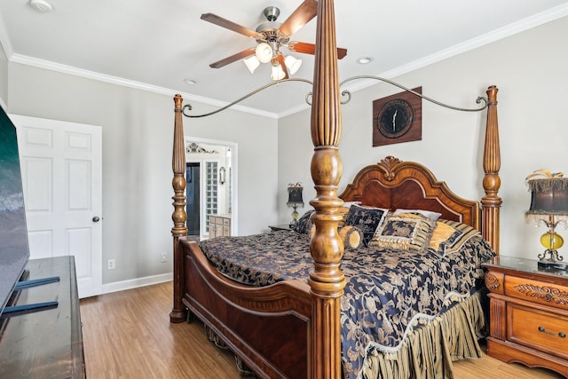 bedroom with ceiling fan, light wood-type flooring, and ornamental molding