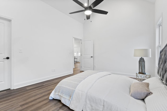 bedroom featuring high vaulted ceiling, ceiling fan, and dark wood-type flooring