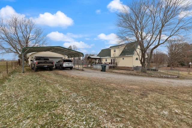 view of yard with a carport