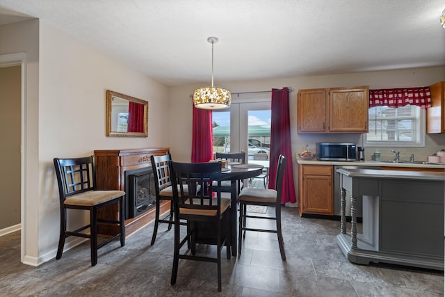 dining space featuring sink