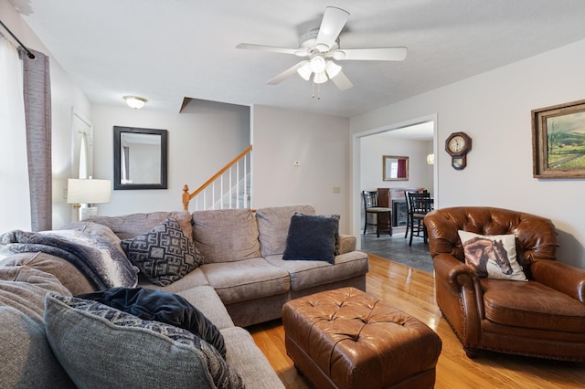 living room with ceiling fan and wood-type flooring