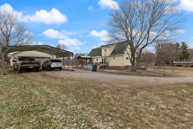 view of yard featuring a carport