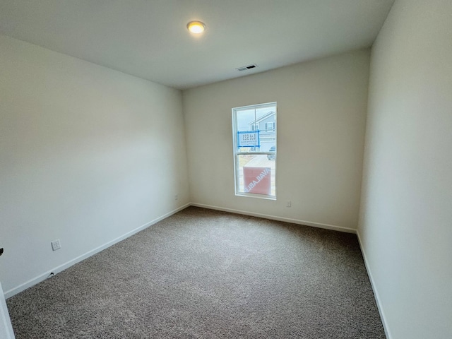 empty room featuring carpet