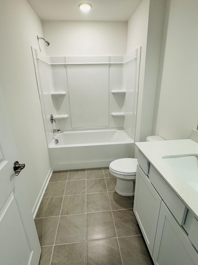 full bathroom featuring vanity,  shower combination, tile patterned floors, and toilet