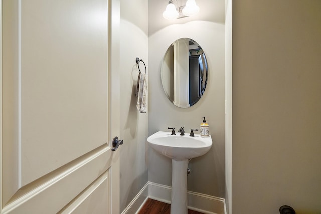 bathroom featuring wood-type flooring