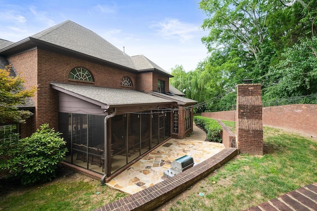 rear view of house featuring a patio area