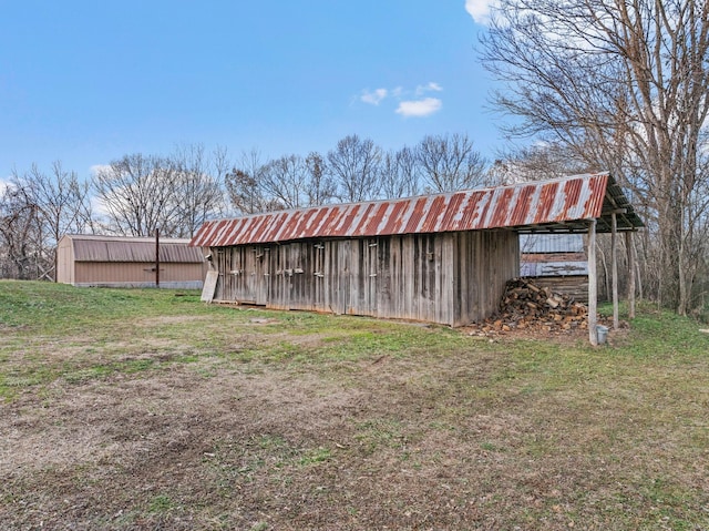 view of outdoor structure with a yard