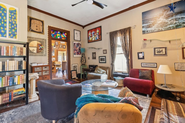 living room featuring ceiling fan, crown molding, and wood-type flooring