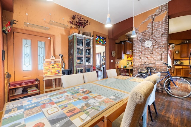 dining area with dark wood-type flooring