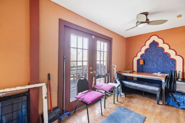 bedroom with french doors, light wood-type flooring, and ceiling fan