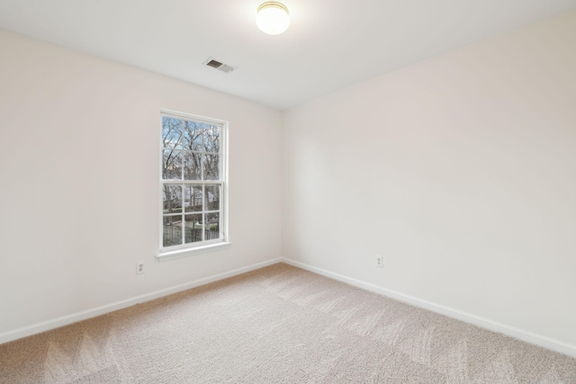 spare room with carpet flooring