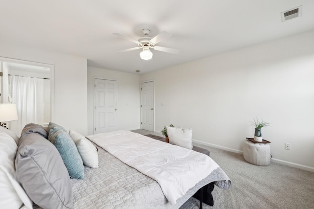 carpeted bedroom with ceiling fan