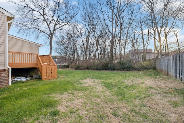 view of yard with a wooden deck