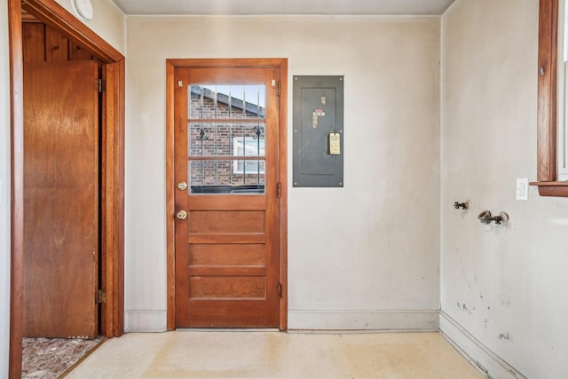 doorway to outside featuring electric panel