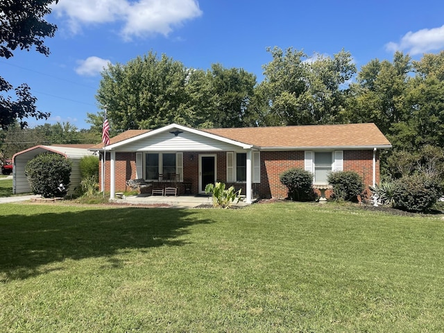 single story home featuring a front lawn