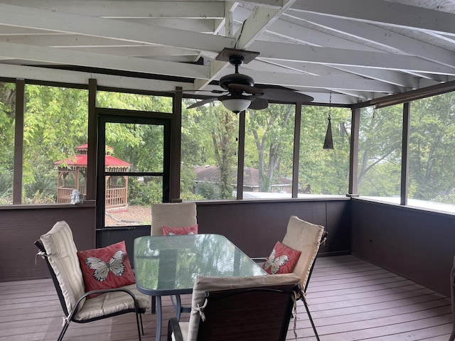 sunroom / solarium with ceiling fan