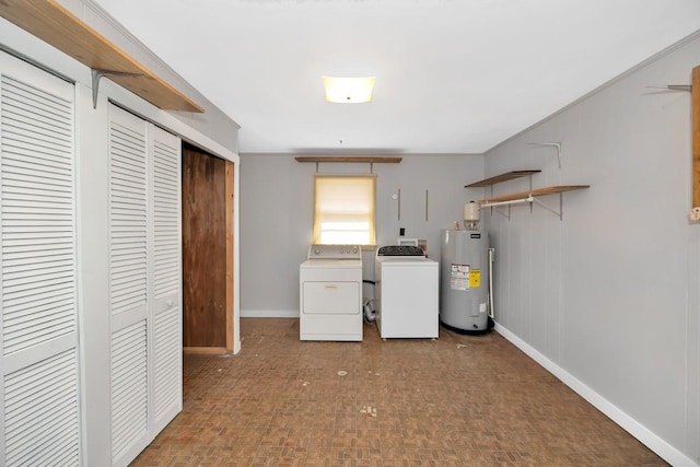 laundry area featuring washing machine and dryer and electric water heater