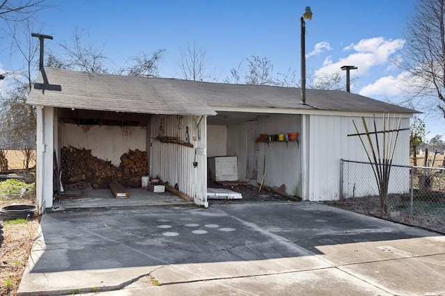 view of outdoor structure with a carport