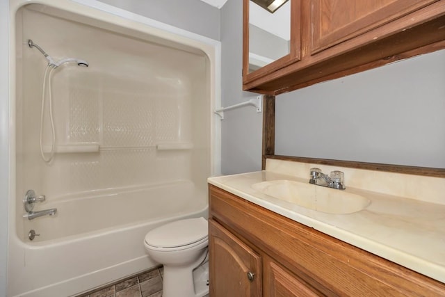 full bathroom featuring vanity, shower / bath combination, and toilet