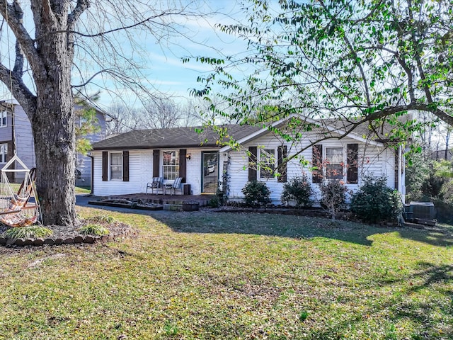 ranch-style house with a front yard