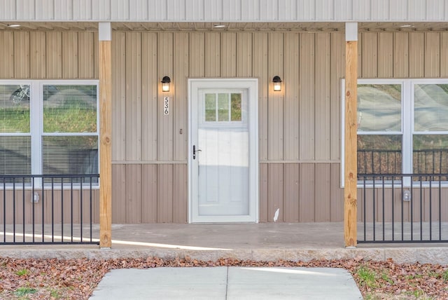 doorway to property featuring a porch