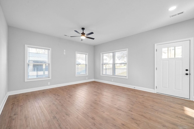 foyer featuring ceiling fan and light hardwood / wood-style floors