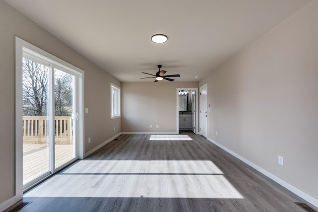 interior space with ceiling fan and hardwood / wood-style floors