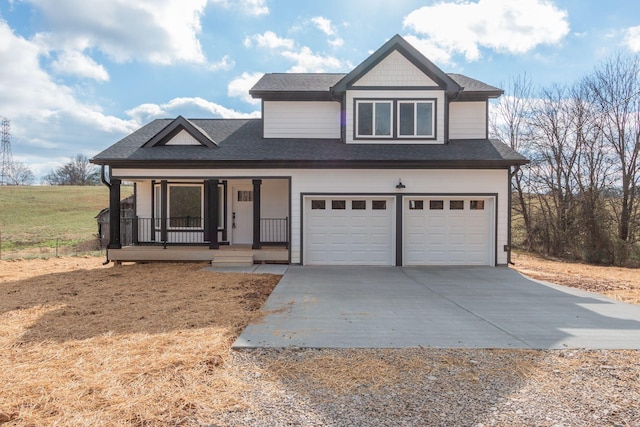 view of front of house with a porch and a garage