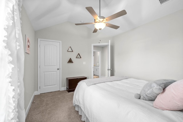 bedroom with light colored carpet, ceiling fan, and lofted ceiling