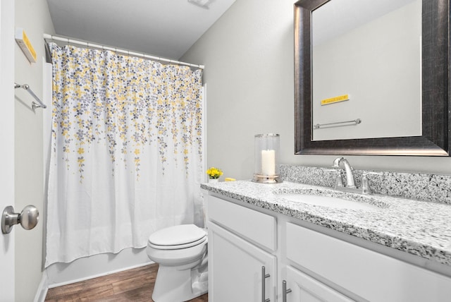 full bathroom featuring vanity, shower / bath combination with curtain, toilet, and wood-type flooring