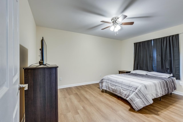 bedroom featuring ceiling fan and light wood-type flooring