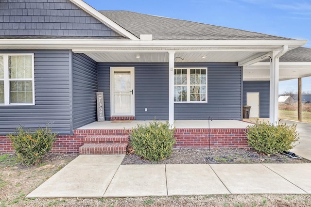 property entrance featuring covered porch