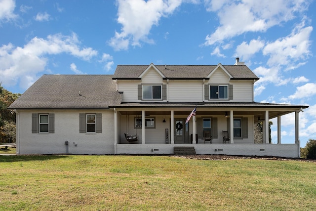 farmhouse inspired home featuring a front lawn