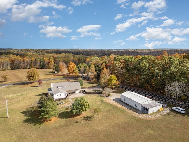 birds eye view of property with a rural view