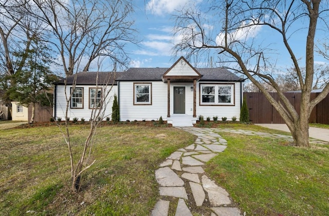 view of front of property with a front lawn