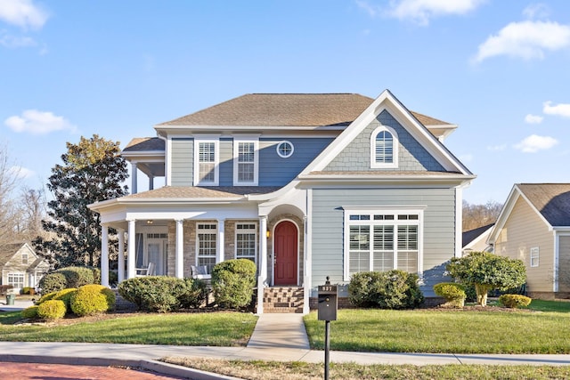 view of front of property with a front lawn