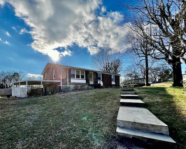 view of front of property with a front lawn