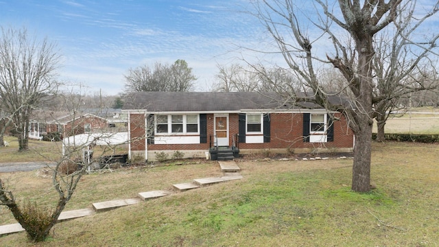 single story home with a front yard