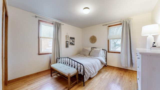 bedroom with light hardwood / wood-style flooring