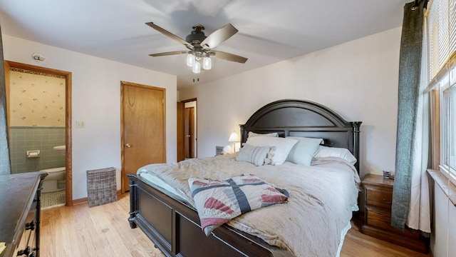 bedroom with ceiling fan and light wood-type flooring