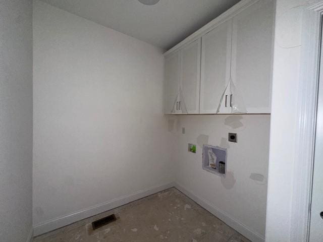 laundry area with cabinet space, baseboards, visible vents, washer hookup, and electric dryer hookup