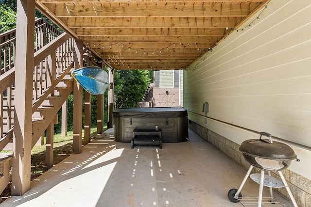 view of patio with a hot tub