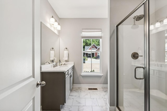 bathroom featuring vanity and walk in shower