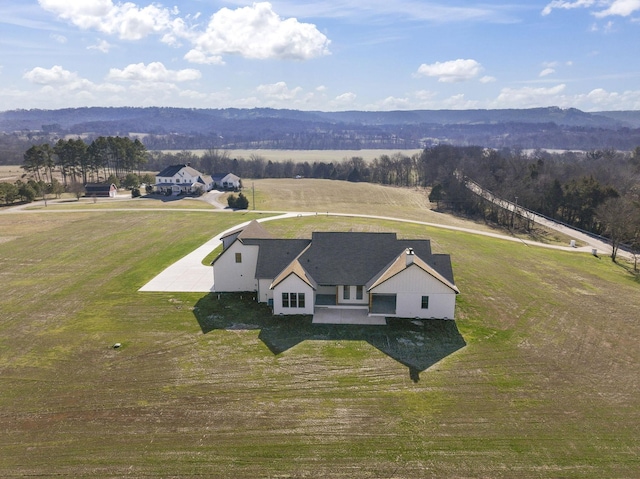 aerial view featuring a mountain view and a rural view