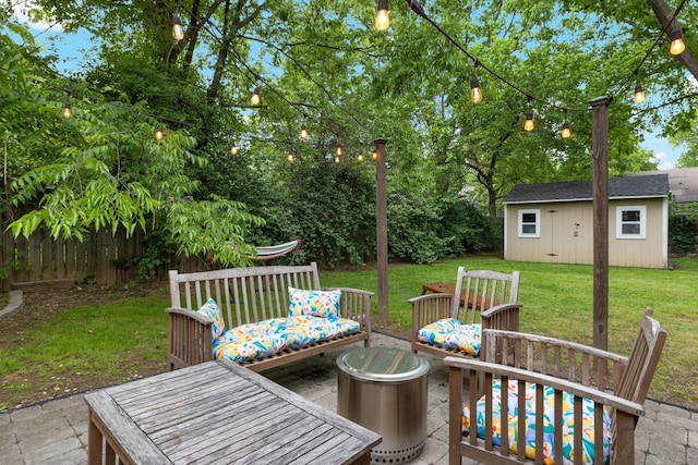 view of patio / terrace featuring an outbuilding