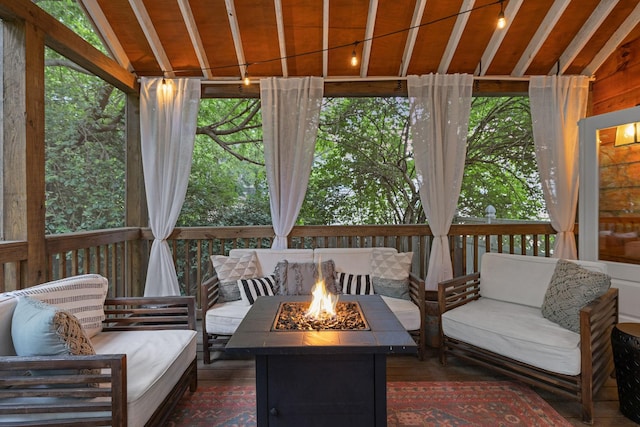 sunroom / solarium with wood ceiling and vaulted ceiling