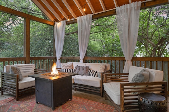 sunroom with wooden ceiling and lofted ceiling