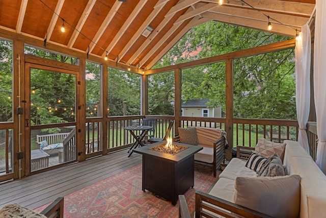 sunroom with vaulted ceiling